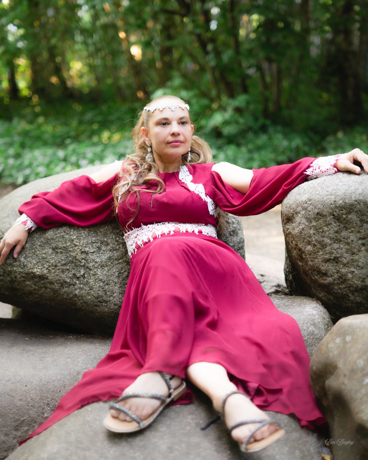 Aynaz resting among sunlit rocks
